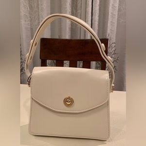 creamy white city bag